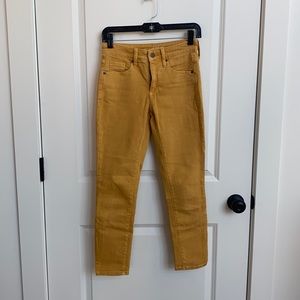Golden yellow universal thread skinny jeans